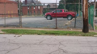 Truck behind fence