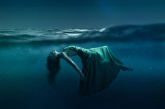 stock-photo-59055596-woman-floating-underwater.jpg